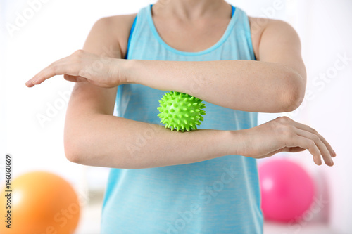 Woman doing exercises with ...