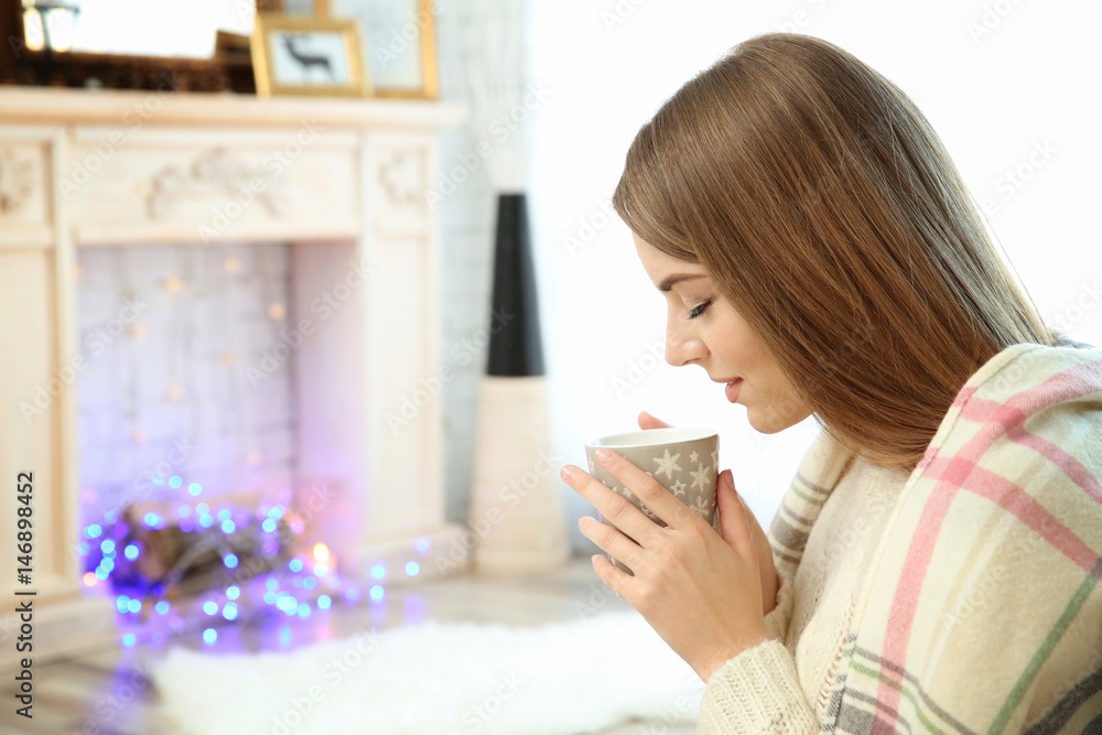Beautiful young woman with cup of coffee at home Beautiful young woman with cup of coffee at home