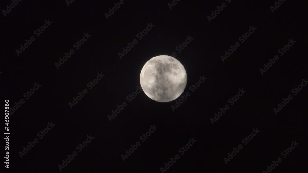 Moon and Dark Fast Clouds in the Night Moon and Dark Fast Clouds in the Night