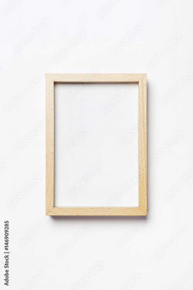 woman hand hold a white photo frame isolated white. woman hand hold a white photo frame isolated white.