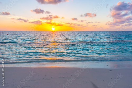 Fototapeta Naklejka Na Ścianę i Meble -  Beautiful sunset with sky over calm sea  in tropical Maldives island