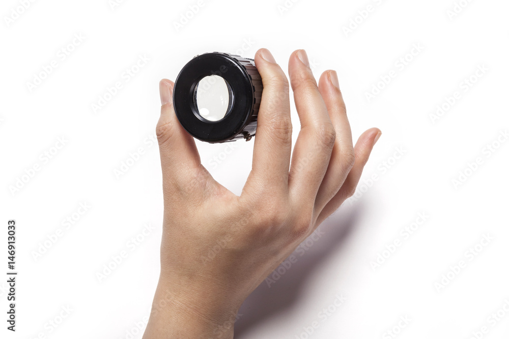 woman hand hold a lupe isolated white woman hand hold a lupe isolated white