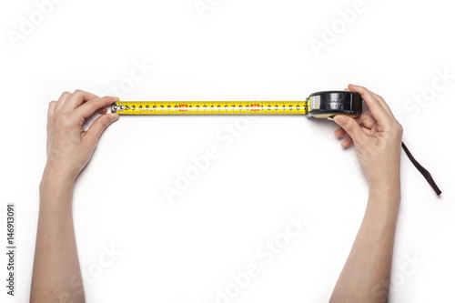 woman hand hold a measuring tape isolated white