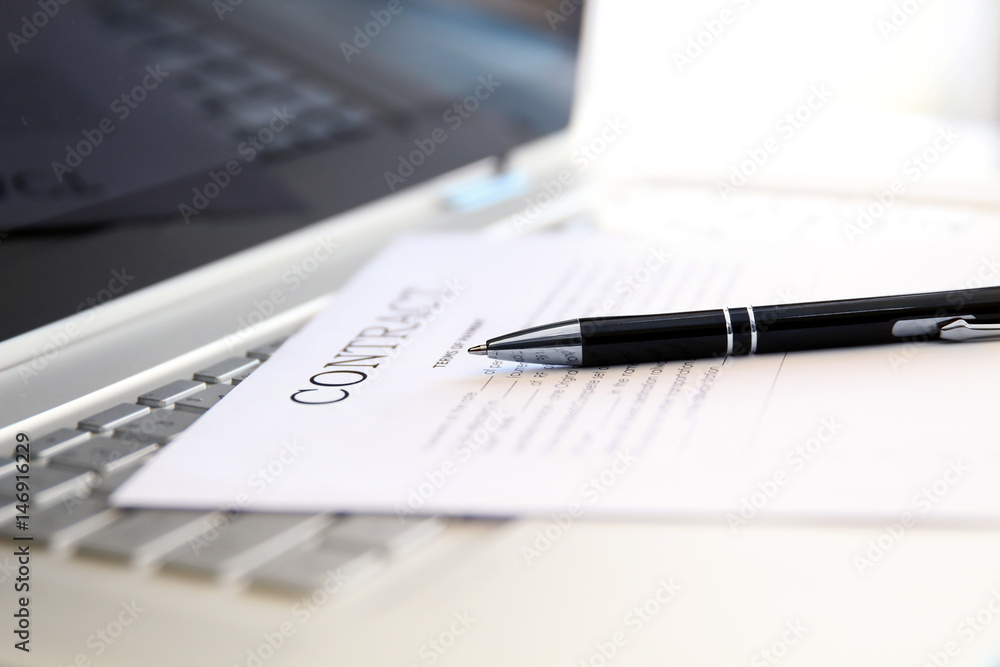 business contract with pen is ready to sign business contract with pen is ready to sign