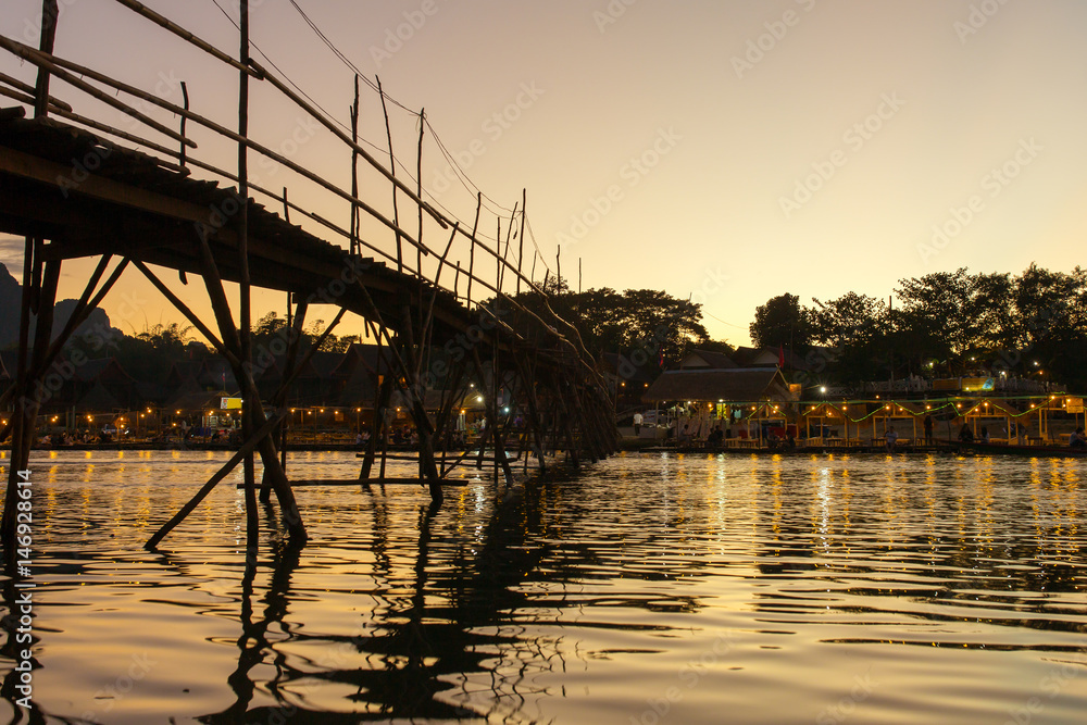 Wooden bridge across Nam Song river at Vang Vieng, Laos