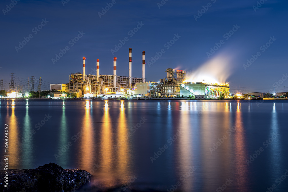 Power station and river at dusk