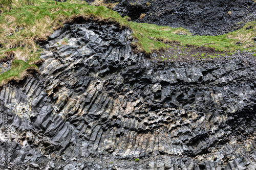 Rock formations on the Reynisfjall mountain, located on the Reynisfjoru beach, near the village of Vik in southern Iceland.