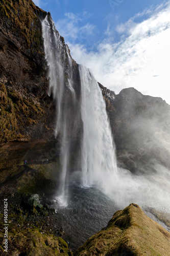 Seljalandsfoss is one of the best known and most popular waterfalls in Iceland. It is a part of the Seljalands River that originates in the volcanic glacier Eyjafjallajokull.