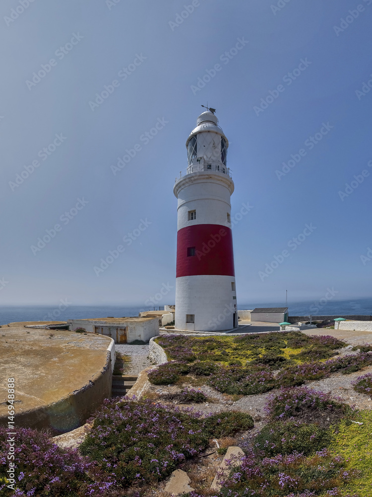  view of the Trinity Lighthouse at Europa Point, in Gibraltar, and the Mediterranean sea