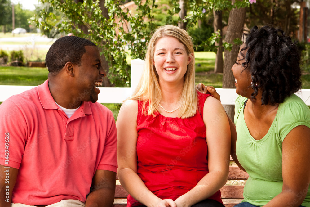 Diverse group of people talking and laughing. Diverse group of people talking and laughing.