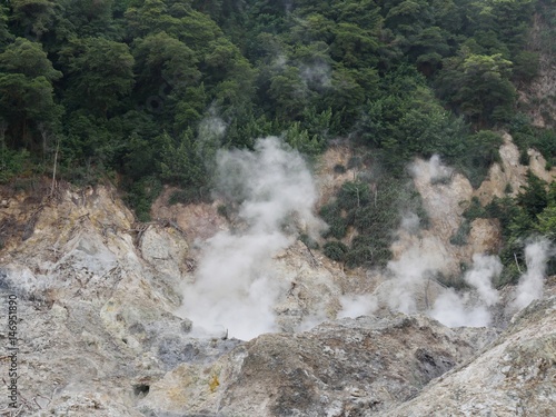 Drive-thru volcano, St Lucia Smoke rises from the popular drive-thru volcano at the Sulphur Springs in St. Lucia, Caribbean islands