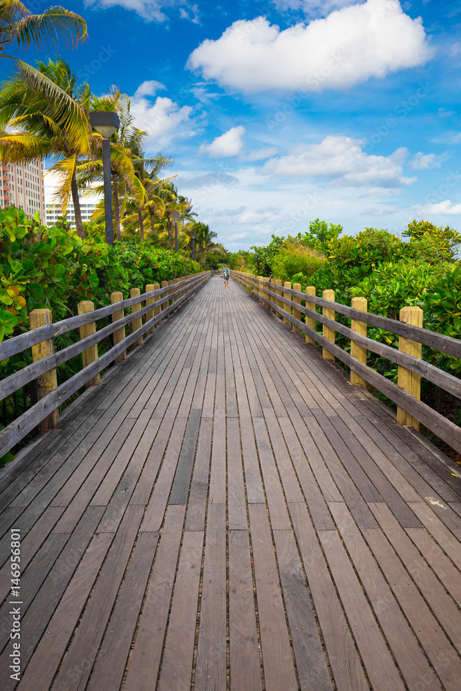 Walkway to famous South Beach, Miami Beach, Florida Walkway to famous South Beach, Miami Beach, Florida