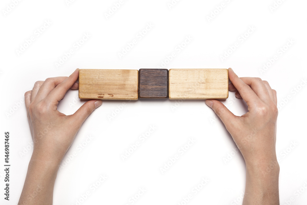 woman hand hold a wood block isolated white.