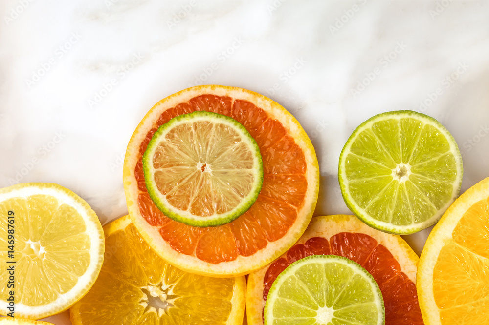 Grapefruit, lime, lemon, and orange slices with copyspace Grapefruit, lime, lemon, and orange slices with copyspace