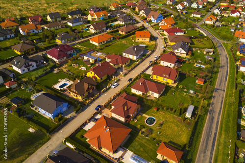 Aerial view of new family houses. Residential zone in the city from above.