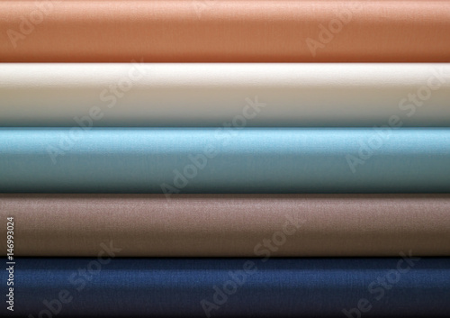 Wall-paper rolls background.