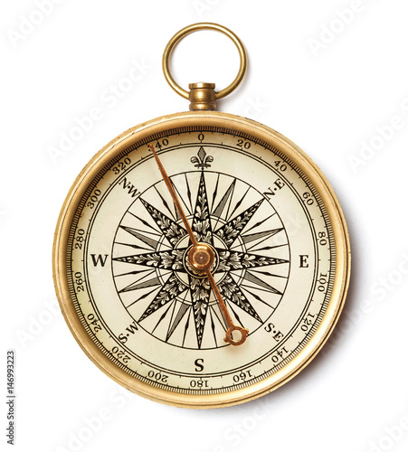 antique compass close up isolated on white background photo