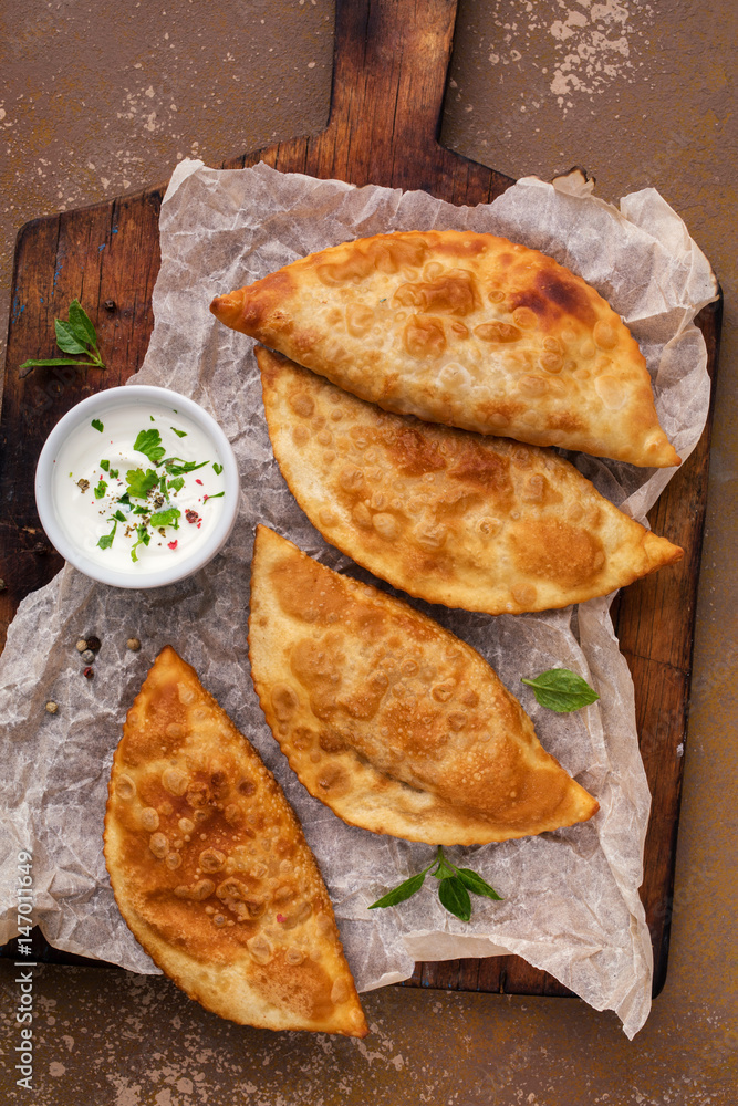 Chebureks fried in oil Chebureks fried in oil