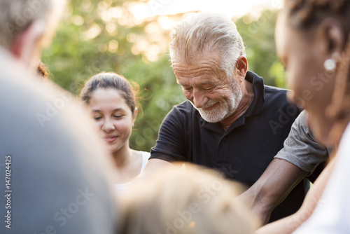 Group of people holding hand assemble togetherness © Rawpixel.com