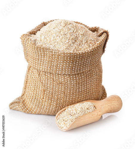 Φωτογραφία bran in sack and wooden scoop