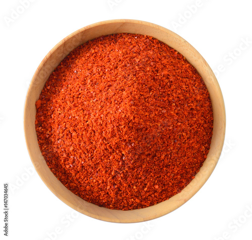 Konstfotografi Cayenne pepper in wood bowl on white background