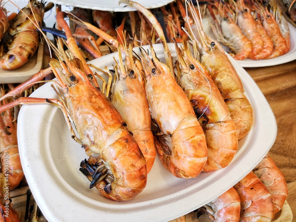Grilled shrimp sale on street market, selective focus
Grilled shrimp sale on street market, selective focus