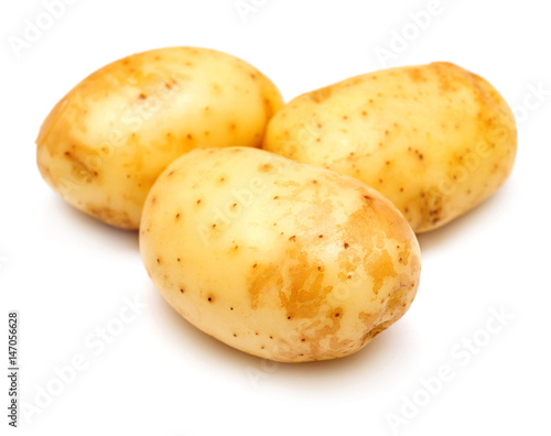 Group of young potatoes isolated on white background. Harvest new. Flat lay, top view