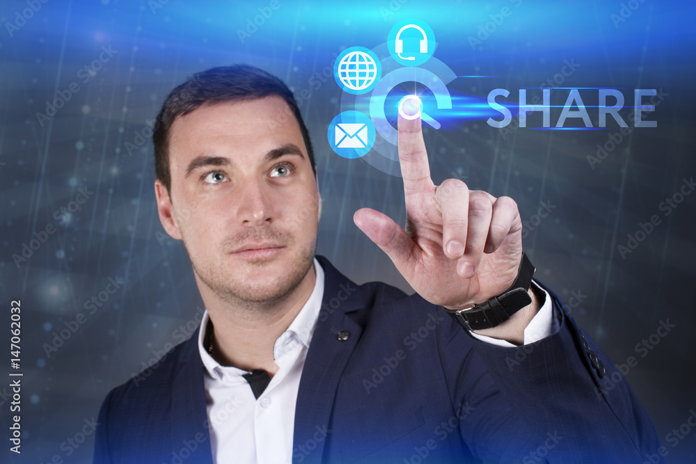 Obraz premium Business, Technology, Internet and network concept. Young businessman working on a virtual screen of the future and sees the inscription: Share