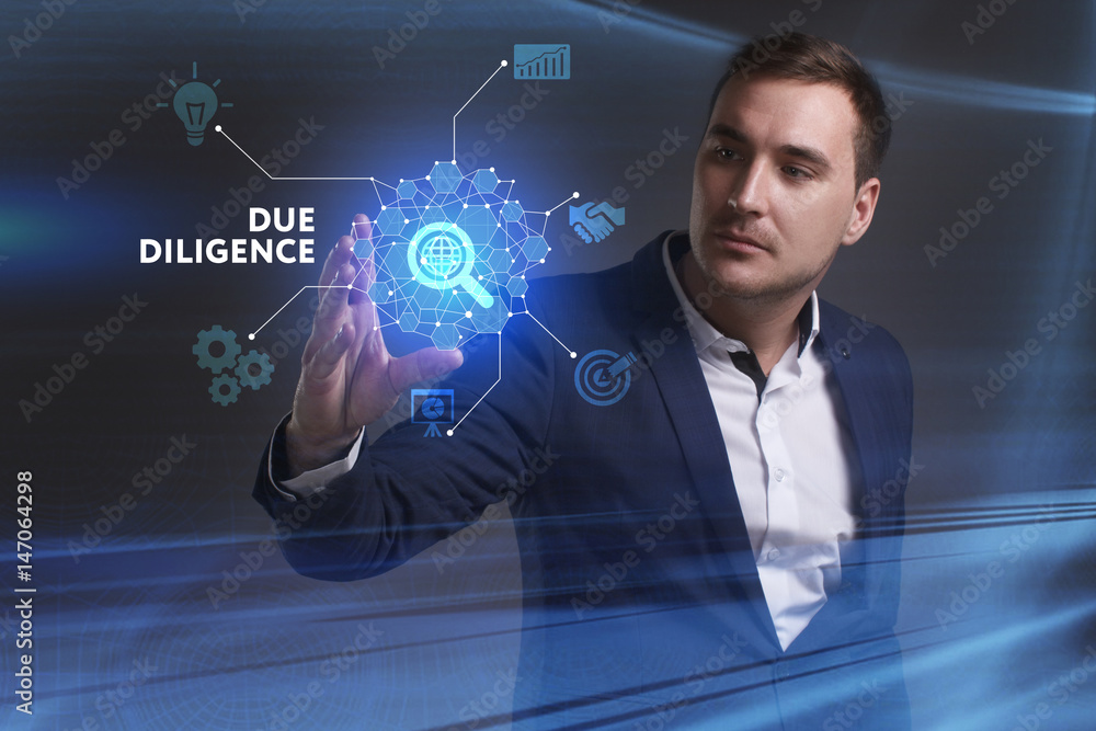 Business, Technology, Internet and network concept. Young businessman working on a virtual screen of the future and sees the inscription: Due diligence Business, Technology, Internet and network concept. Young businessman working on a virtual screen of the future and sees the inscription: Due diligence