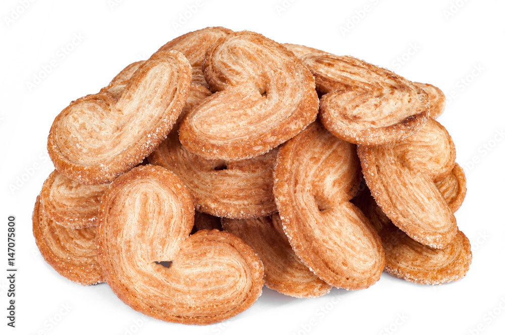 Heap of cookies on white background