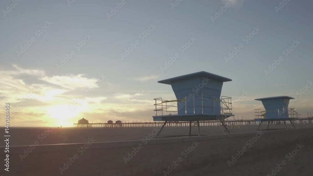 Walking Along Lifeguard Towers In Huntington Beach, California Walking Along Lifeguard Towers In Huntington Beach, California