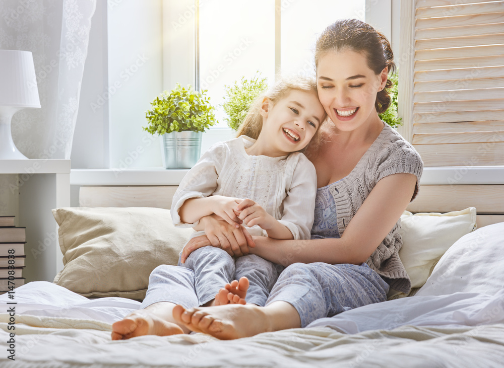 Mom and her daughter are playing Mom and her daughter are playing
