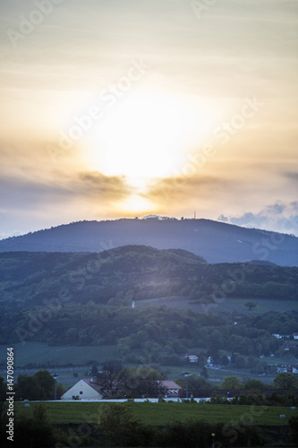 sunset above hills 