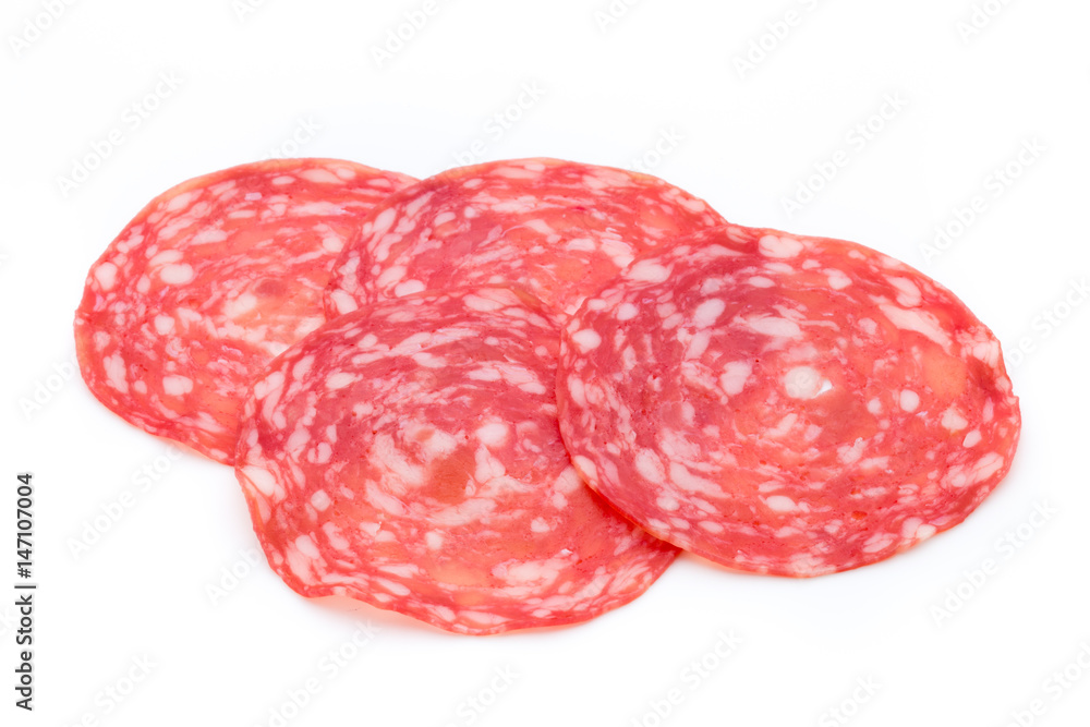 Salami smoked sausage slices isolated on white background cutout. Salami smoked sausage slices isolated on white background cutout.
