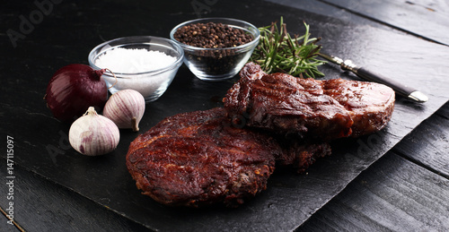 Barbecue Rib Eye Steak on Slate Slab - Dry Aged Wagyu Entrecote Steak photo