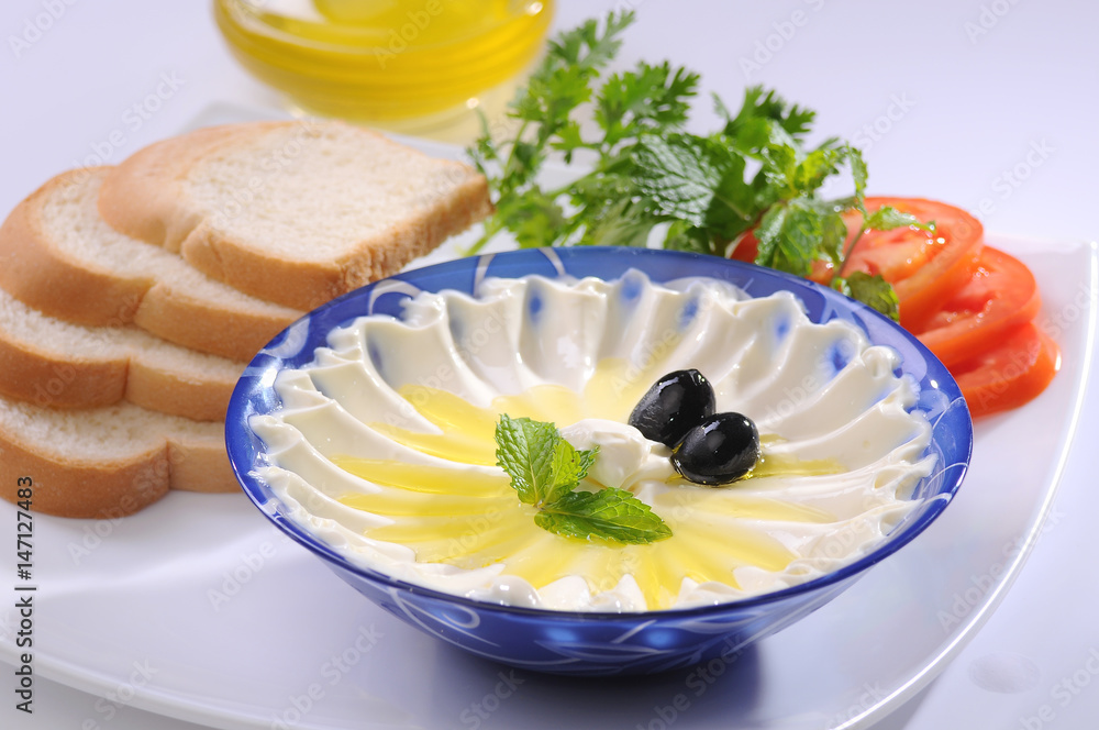 Labneh with olive oil & Bread Stock Photo Adobe Stock