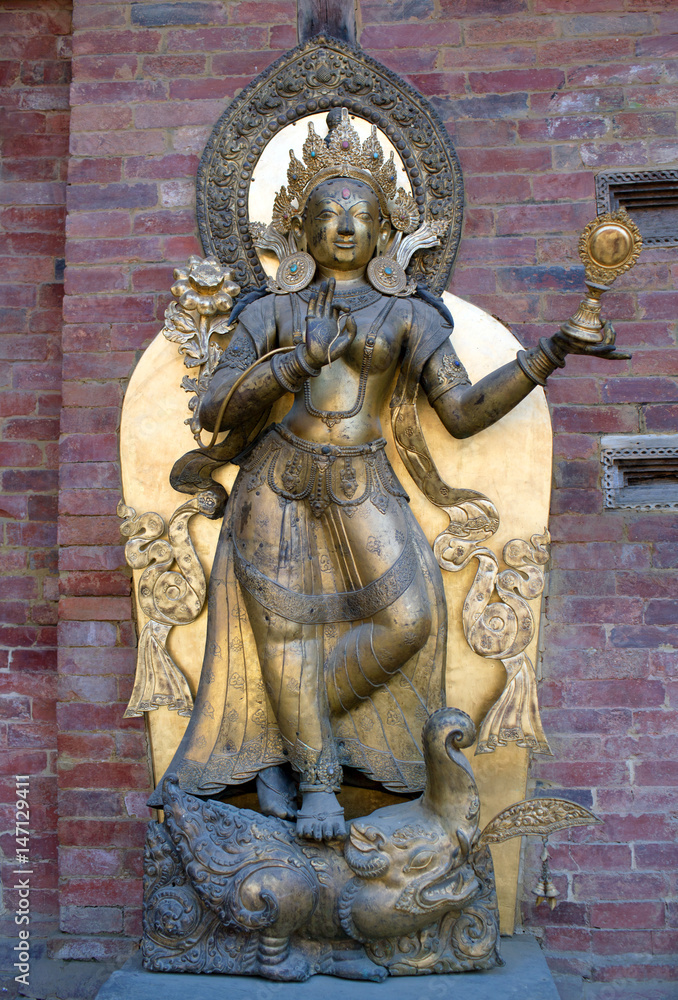 Ancient statue in Royal Palace at Mul Chowk in Patan, Kathmandu Valley, Nepal Ancient statue in Royal Palace at Mul Chowk in Patan, Kathmandu Valley, Nepal