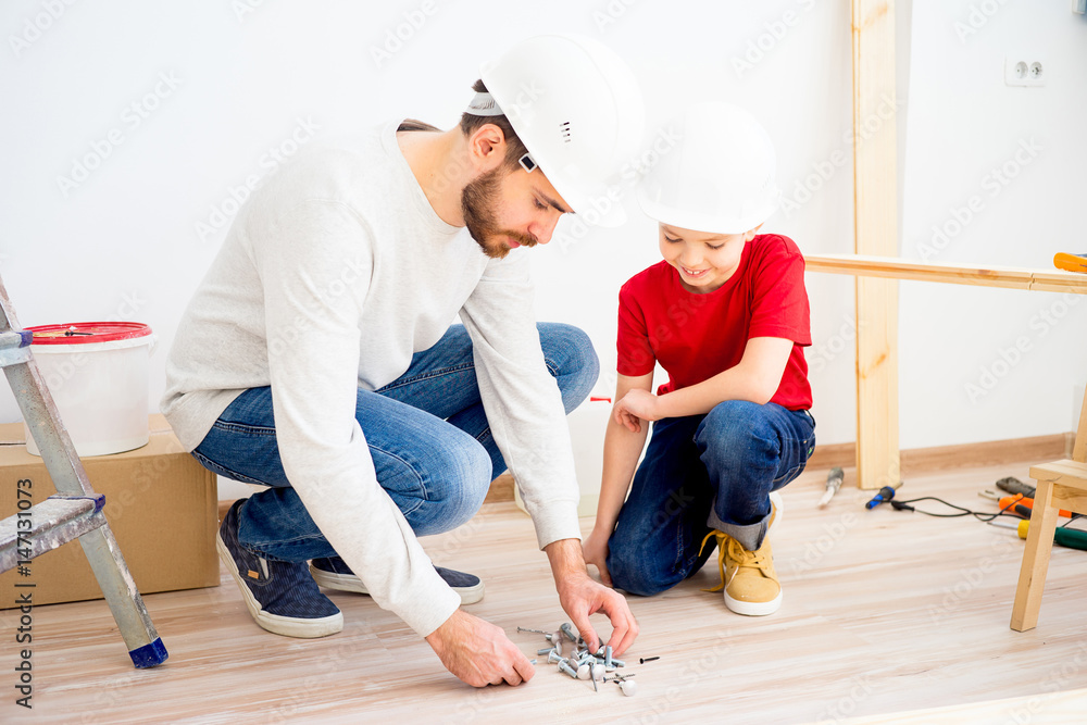 Father and son working together