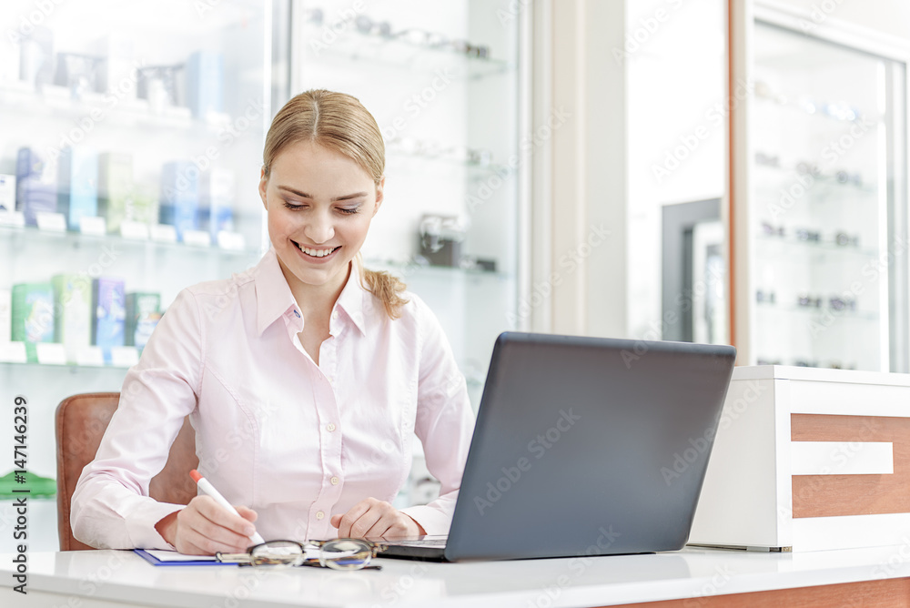 Concentrated smiling woman at work Concentrated smiling woman at work
