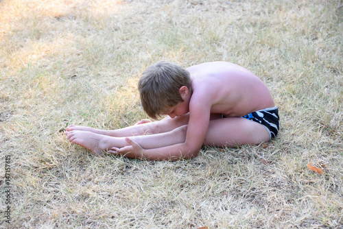 The boy doing gymnastics exersise