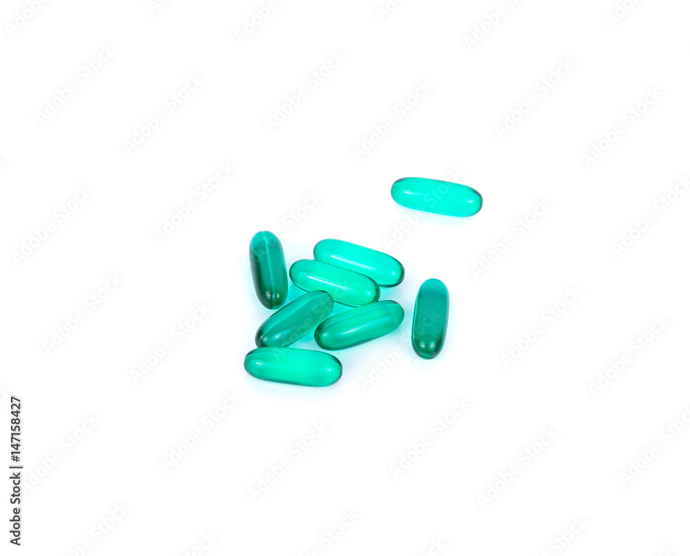 green pills medicine on white background green pills medicine on white background