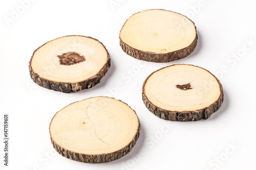 Four Wooden beverage coaster on a white background