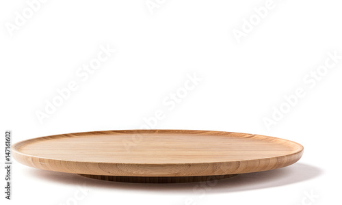 Bamboo lazy susan on a white background side view photo