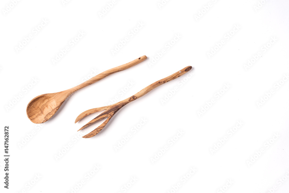 Wooden salad servers on a white background Wooden salad servers on a white background