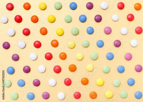 Wallpaper Mural Lollipops sweets. Candy, top view flat lay on yellow background. Sweet sucker, lollipop, candy, isolated minimal concept above decoration, food background Torontodigital.ca