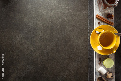 cup of coffee and ingredients on table