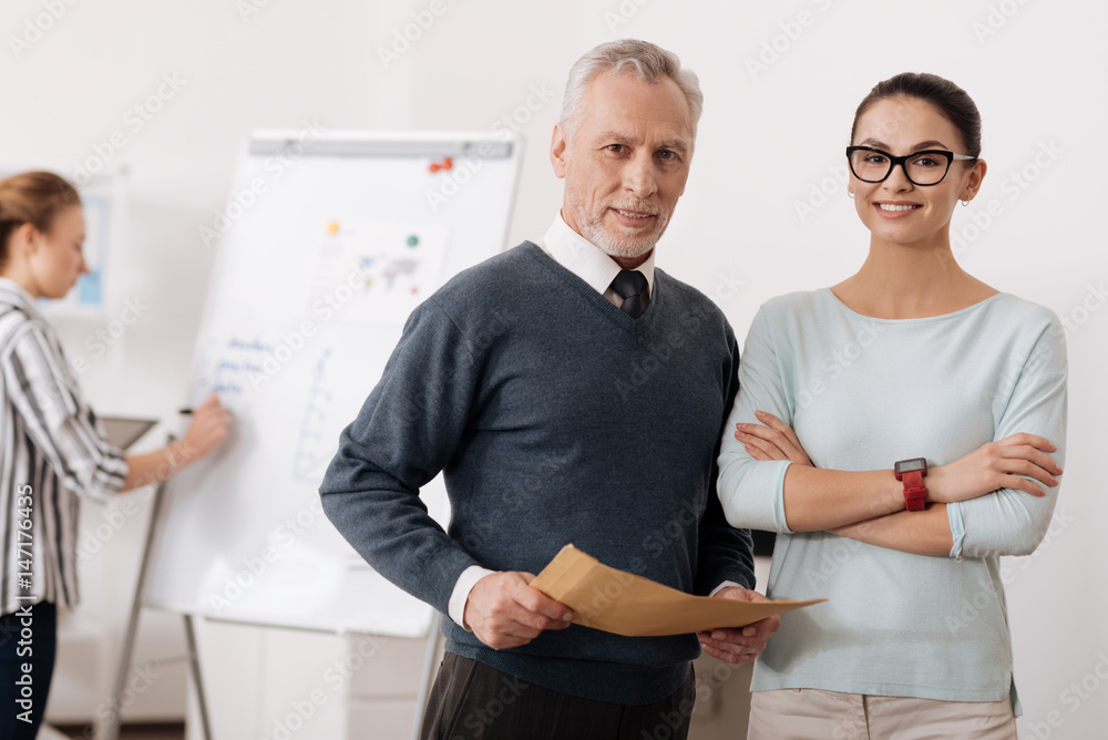 Fototapeta premium Two colleagues posing together on camera