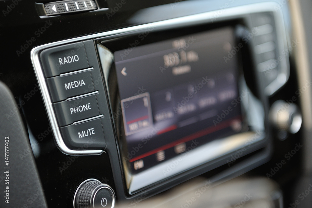 The multimedia control buttons in the car