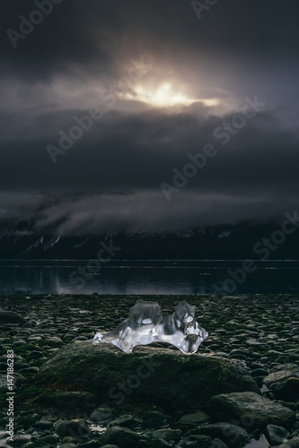 Glowing Ice and Sun Beams Bursting Clouds, Haines Alaska © Gabriel