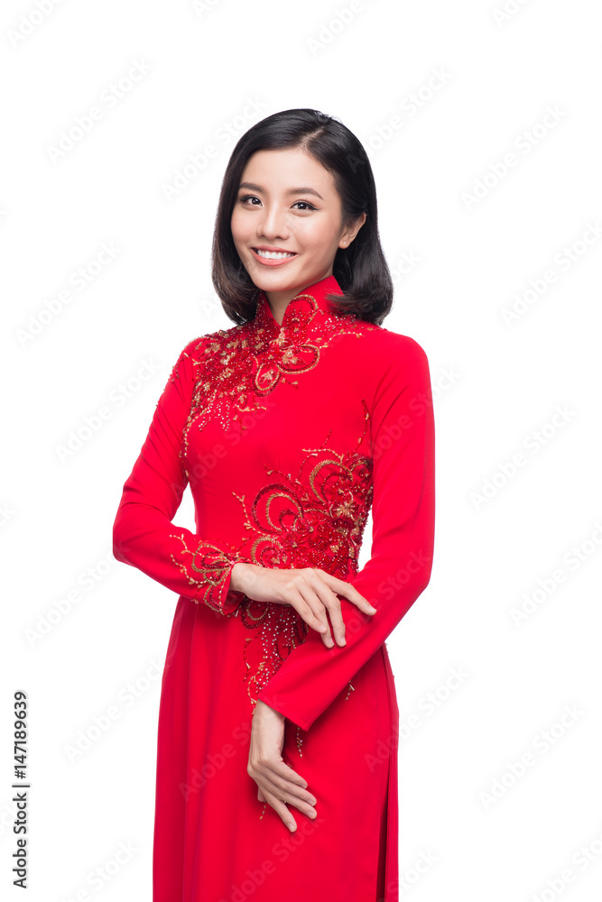 Charming Vietnamese Woman in Ao Dai Traditional Dress isolated on white. Charming Vietnamese Woman in Ao Dai Traditional Dress isolated on white.